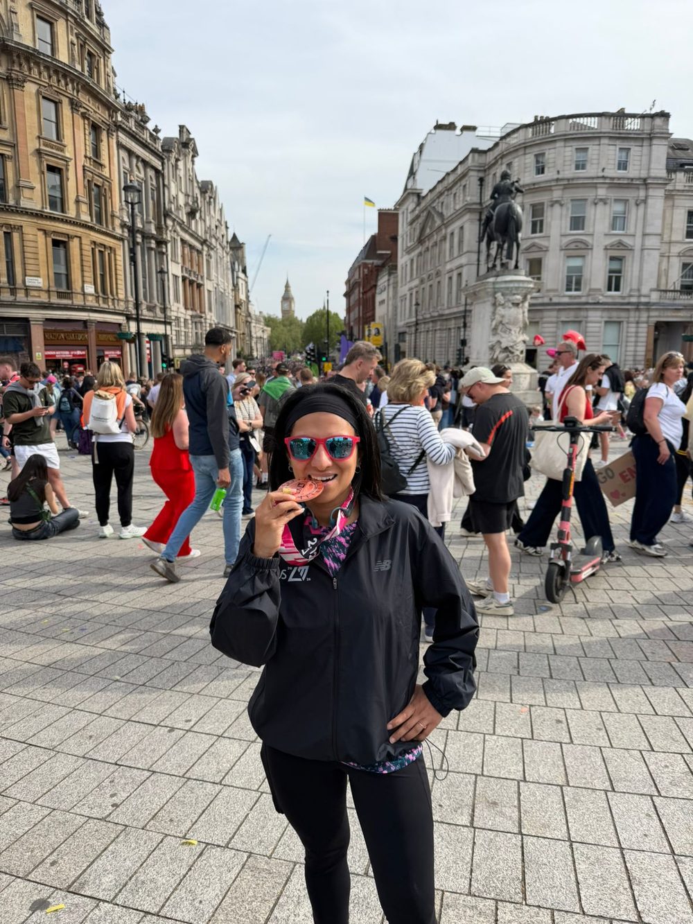 Coached athlete with her finisher medal at the London Marathon